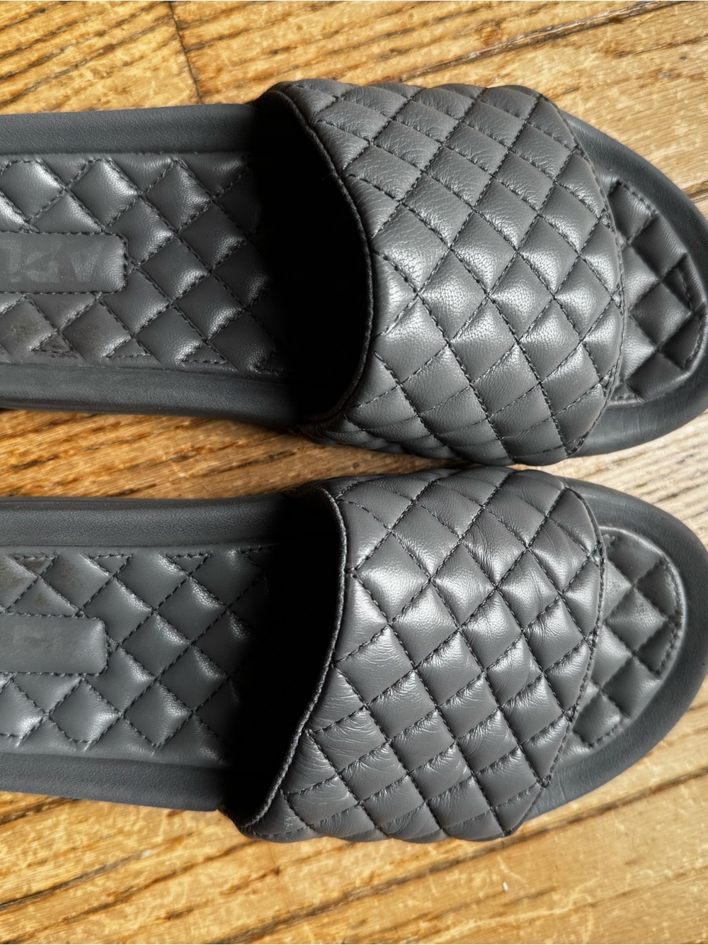 APL Lusso Leather Quilted Slide Sandals in Dark Gray